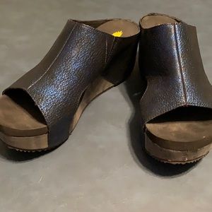 Volatile blue sparkly platforms